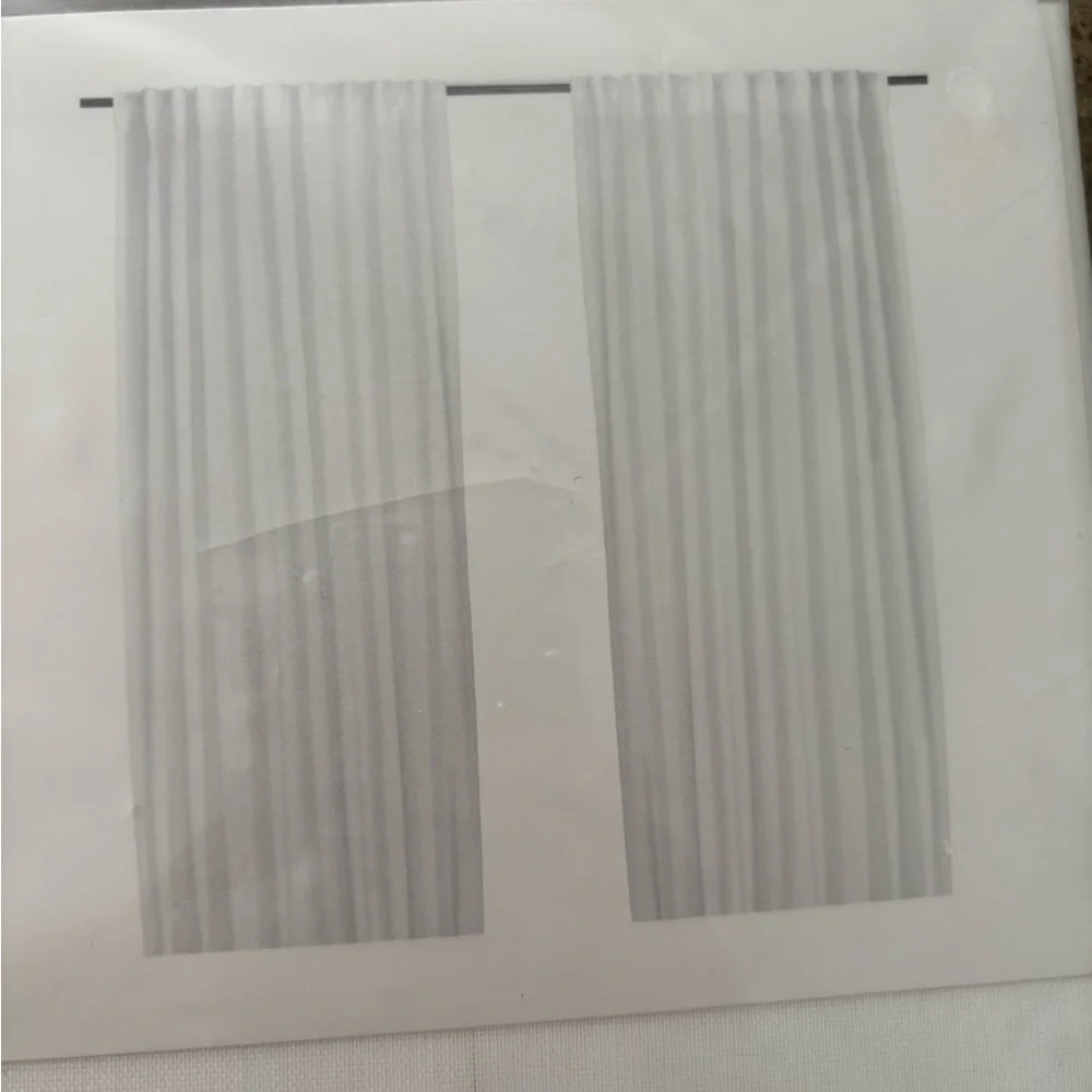 IKEA brand new white curtains. 1 set of 2